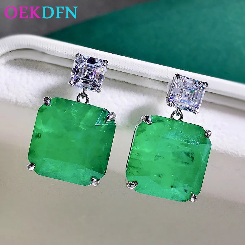 

Винтажные женские серьги-подвески из серебра 100% пробы с квадратным изумрудом