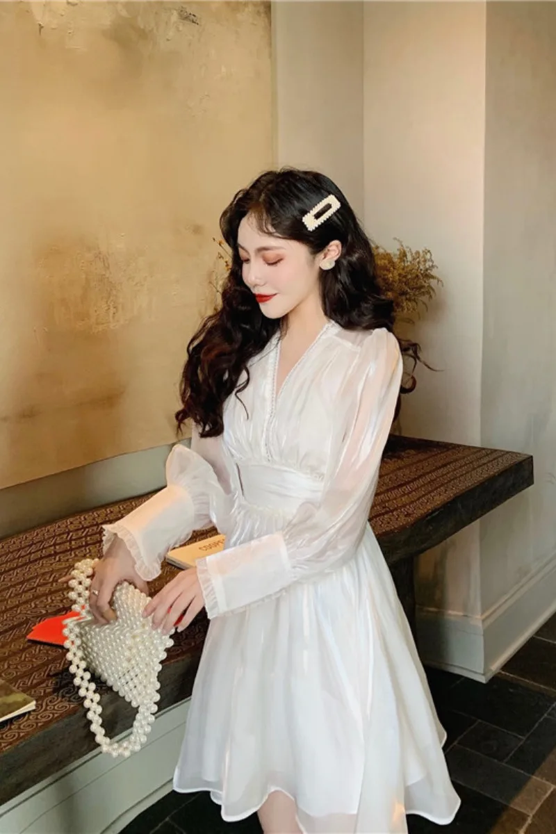 

French sexy perspective waist long sleeve dress 2021 summer new white bubble sleeve dress children