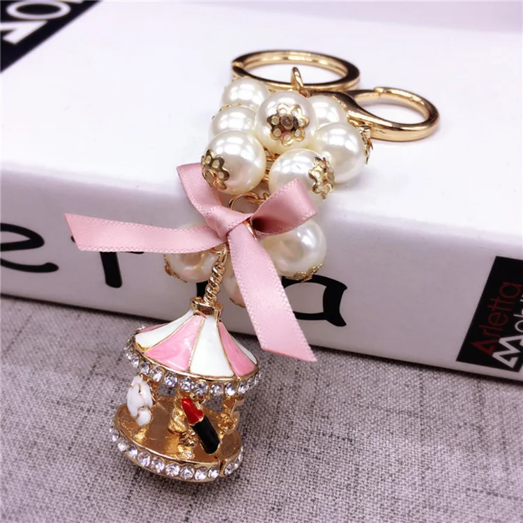 New Creative Fashion Carousel Key Chain Personality Trend Pearl Charm Key Chain Lady Cute Bag Mobile Phone Pendant Key Chain