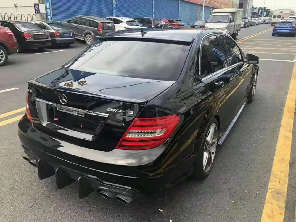 

Carbon fiber Car Rear Bumper Spoiler Lip Auto Car Diffuser For Mercedes-Benz W204 C63 AMG 4 Door 2009 2010 2011