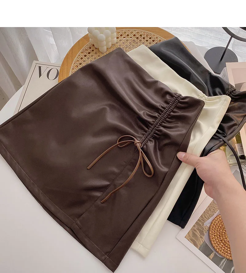 

Autumn new style Korean bow pleated A-line high waist PU leather bag hip skirt women