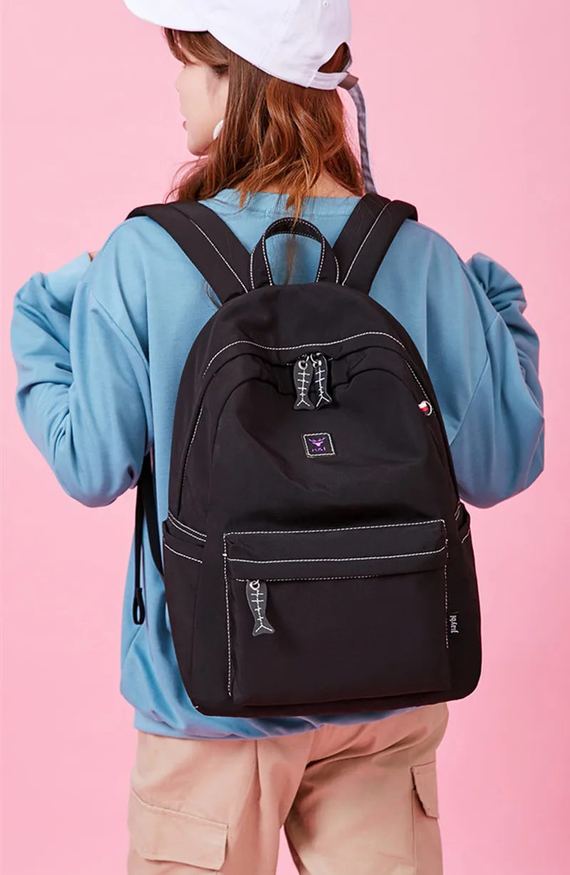 Модный водонепроницаемый полиэстеровый школьный рюкзак для студентов.