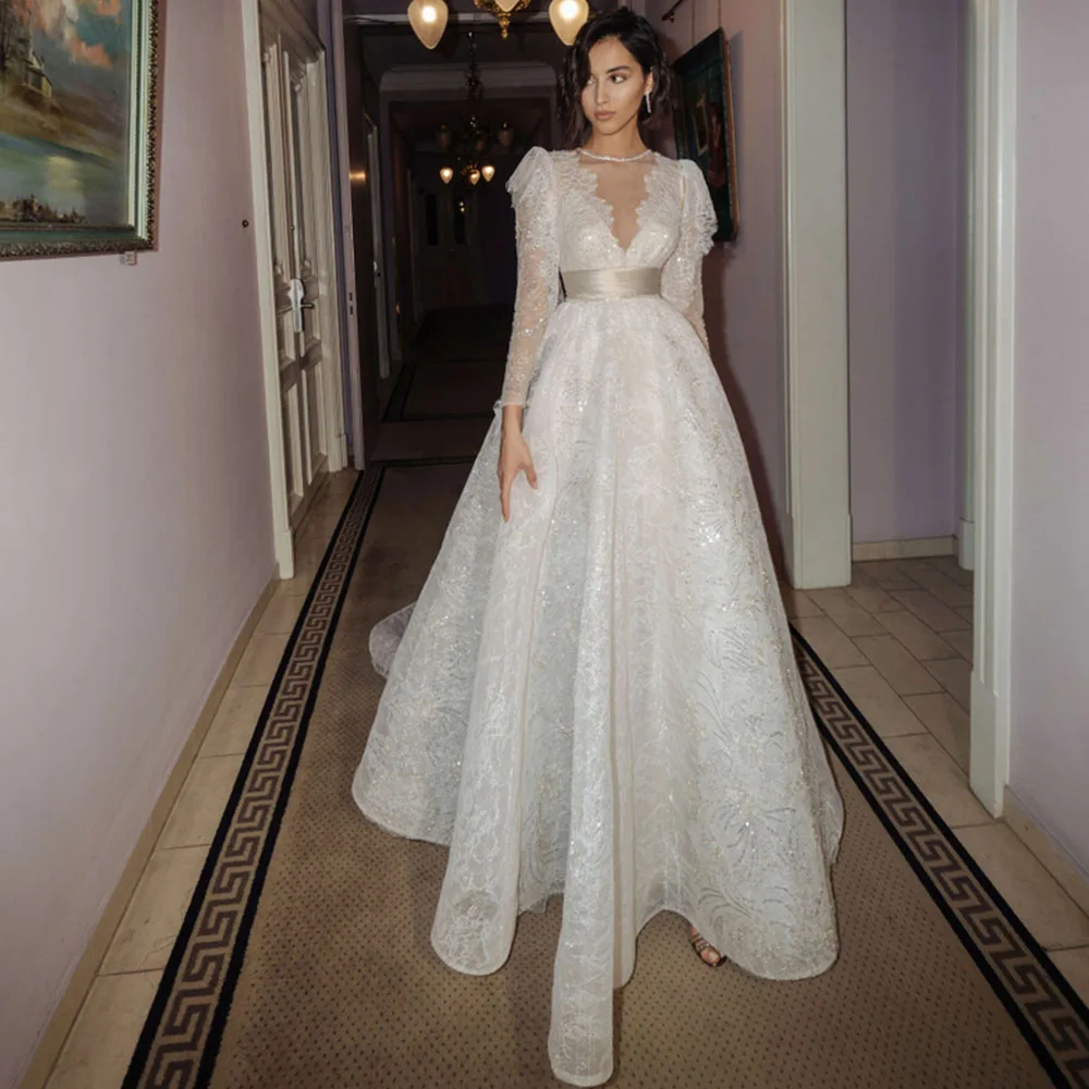 

Sparkly V-Neck Wedding Gowns Long Sleeve Sashes Tulle A-Line Buuton Back Court Train Sequined Bridal Dresses Vestidos De Novia