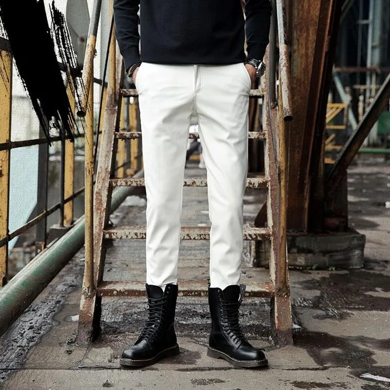 Сезон весна лето Новинка мужские узкие брюки из искусственной кожи в Корейском