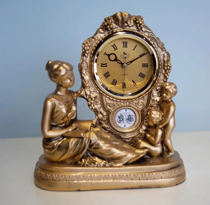 

New creative European mother child clock living room bedroom table clock quartz clock goddess silent clock