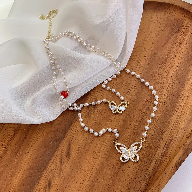 

Minar Temperament Shiny Rhinestones Butterfly Pendant Necklace for Women Hollow Beads Simulated Pearl Chokers Necklaces Jewelry