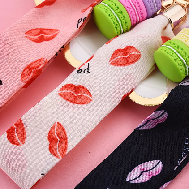 

New Keychains Macaron Cake Key Chains Silk Letter Ribbon Hand Cord Pendant Key Rings Give A Girl's Favorite Gifts