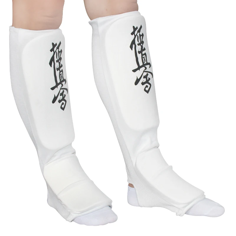 

Kyokushin karate Shin Instep Guards MMA Kyokushinkai защита для ног тхэквондо спарринговые прокладки для ног Белые Черные тканевые прокладки для детей