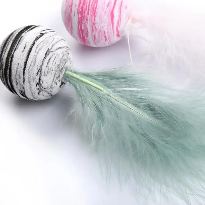 

1Pcs Funny Cat Toys Ball With Feather Playing Chew Tumbler EVA Material Light Cat Toy Interactive Training Toys Cat Accessories