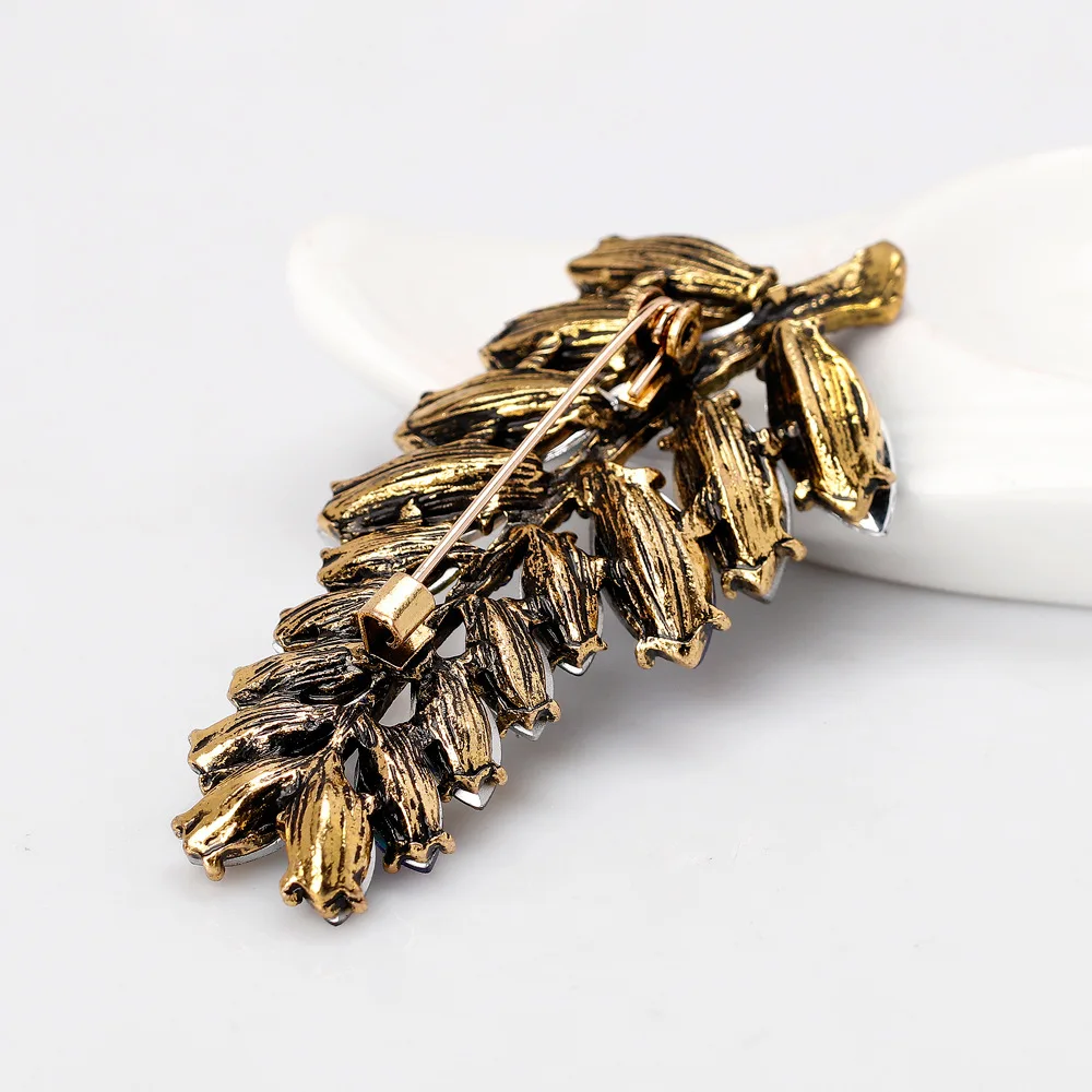 

Luxury Female Rainbow Crystal Brooch Charm Gold Color Jewelry Brooch For Women Cute Leaf Zircon Pin Dress Coat Accessory