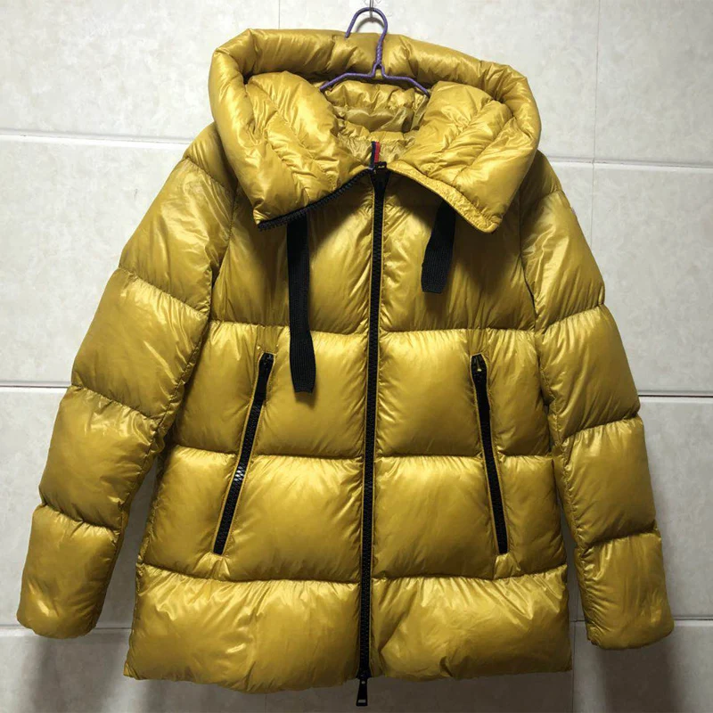 

Женский пуховик с капюшоном, на белом утином пуху, размеры 1-4