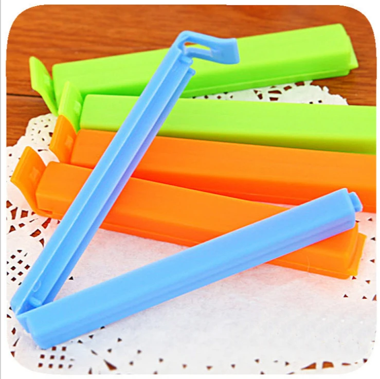 

4pcs/lot Househould Food Snack Storage Sealing Bag Clips Sealer Clamp Food Bag Clips Kitchen Tool Home Food Close Clip