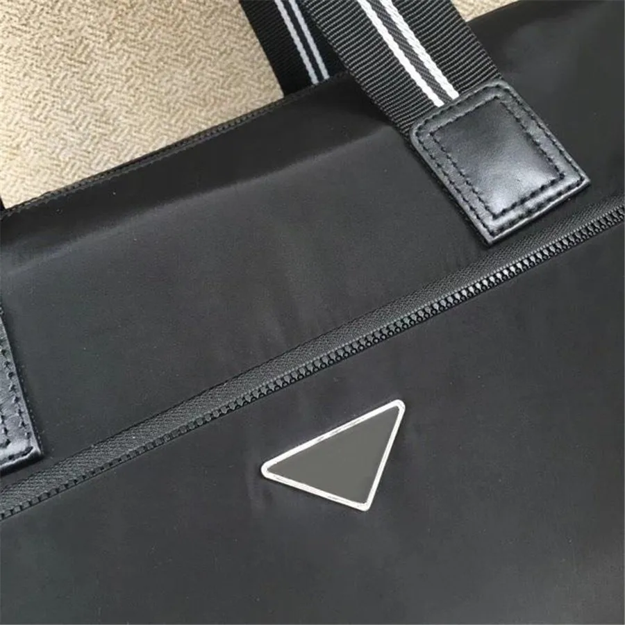 

Men's black nylon and leather waterproof travel bag simple leisure suitcase sports outdoor large capacity classic handbag