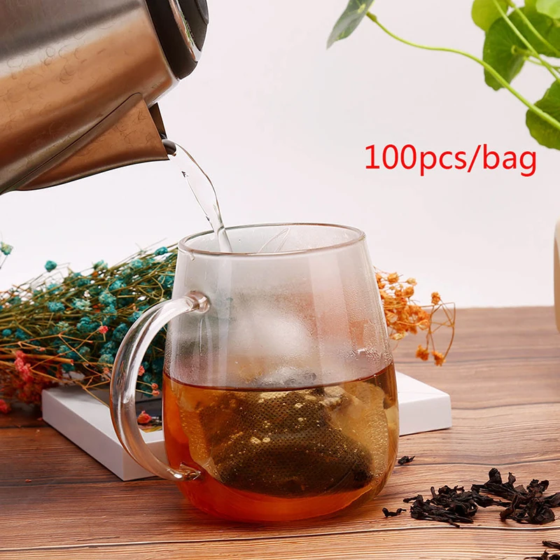 

Tea Bags 100Pcs/Lot Empty Scented Drawstring Pouch Bag 5*7CM Seal Filter Cook Herb Spice Loose Coffee Pouches Tools