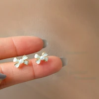s925 needle sweet jewelry mini bowknot earrings popular design white enamel simulated pearl stud earrings for women gifts
