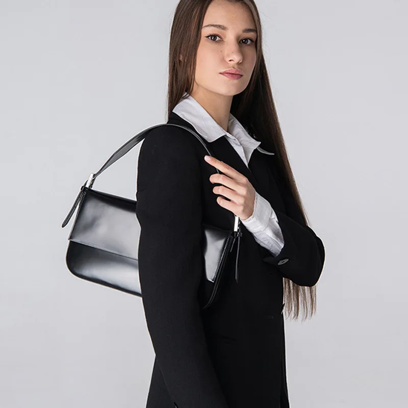 

Brand Cowhide Leather Bag Women Simple Luxury Baguette Hand Clutch One Shoulder Armpit Port Korean Mini Classical 2001