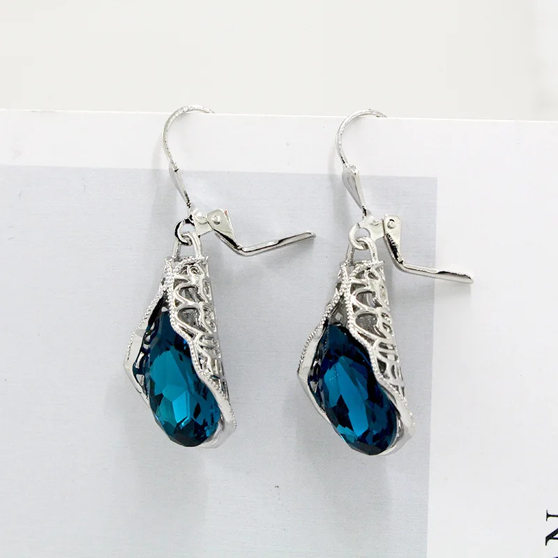 

2022 Trendy Navy Blue Zircon Crystal Hollow Dangle Earrings for Women Party Wwdding Jewelry Classical Palace Style Accessories