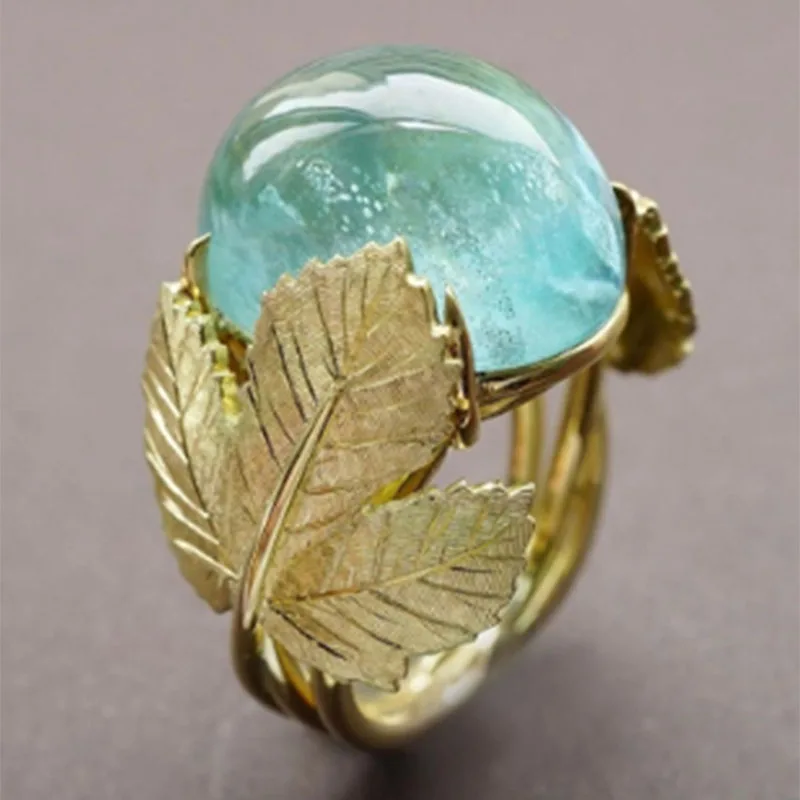 

Delicate Jewelry Gold Metal Leaves Blue Resin Stone Ring Fashion Plant Maple Leaf Moonstone Wedding Rings for Women B4Z031