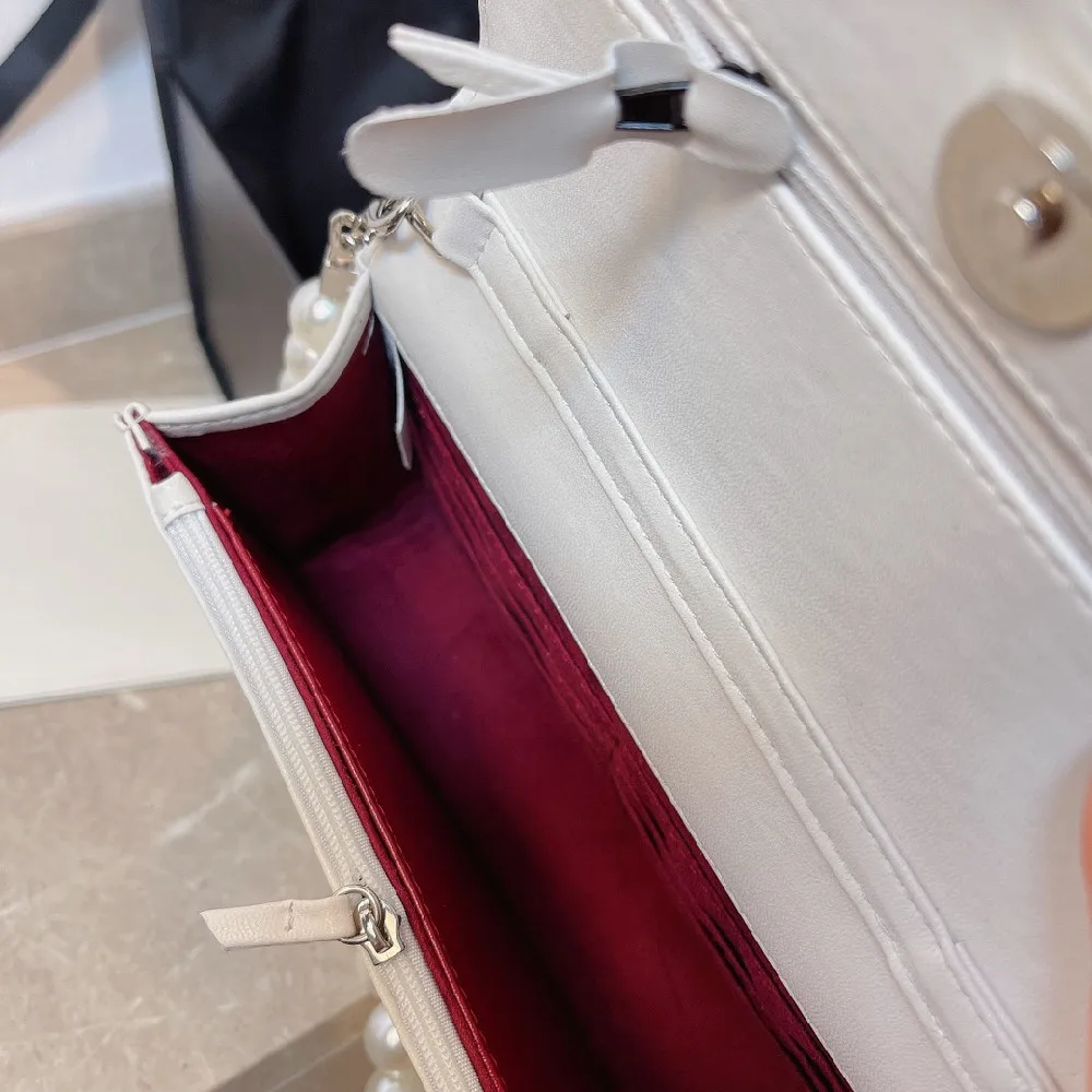 

2021 new pearl shoulder strap one shoulder messenger mobile phone coin purse