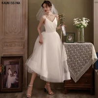 kaunissina mid calf length wedding dresses spaghetti straps sexy v neck tulle ivory bridal gowns backless simple wedding gowns