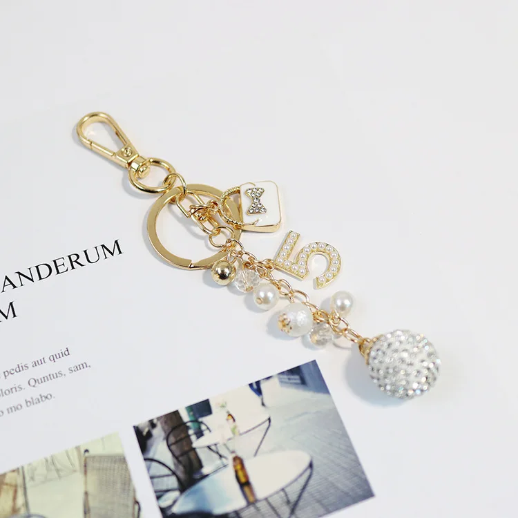 Creative Fashion Novel Pearl Pendant Key Chain  Fashion Clothes Metal Charm Key Chain   Lady Cute Bag Mobile Phone Key Chain