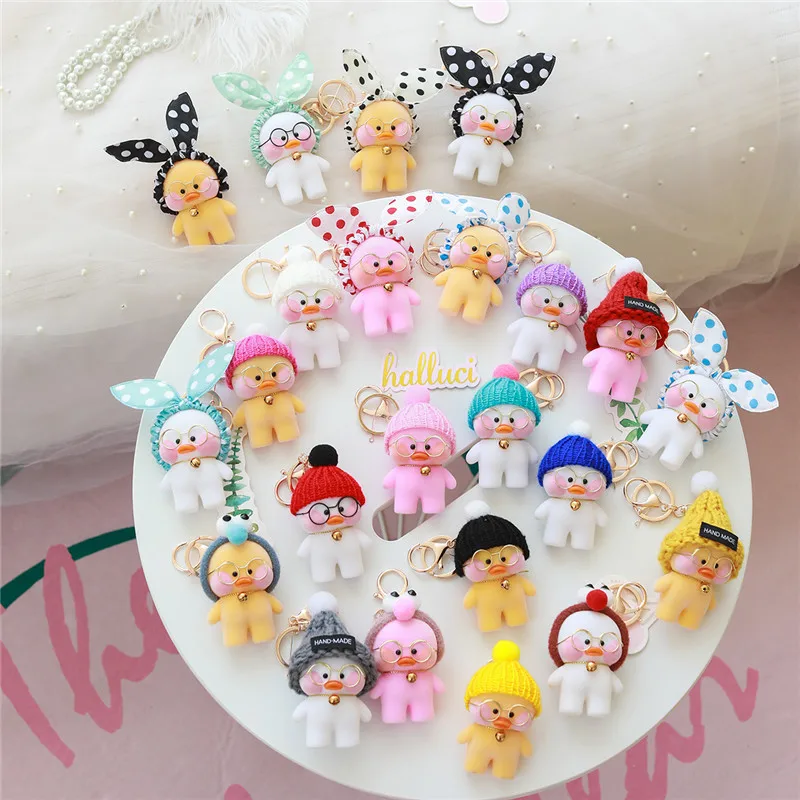

10cm Cute Duck Keychain Kawaii Cafe Mimi Yellow Duck Action Figure Keyring Bags Decoration Toys For Children Gifts