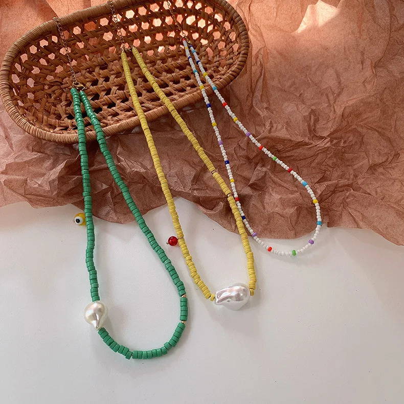 

Ins Bohemian style European and American retro multi-layer color rice beads baroque pearl string necklace clavicle chain female