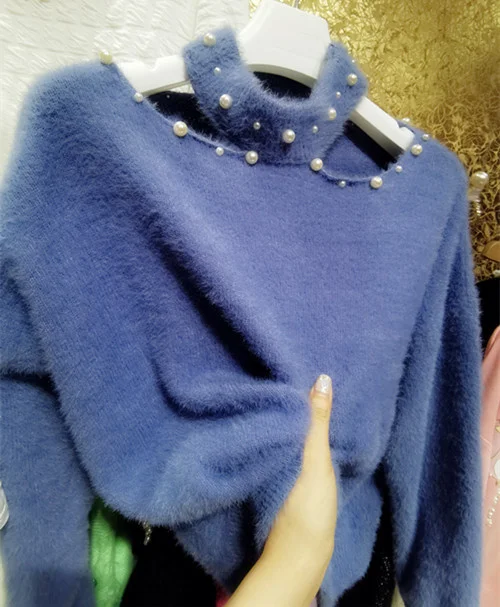 

Korea East Gate color white gorgeous heavy industry nail pearl sexy Plush thickened sweater special