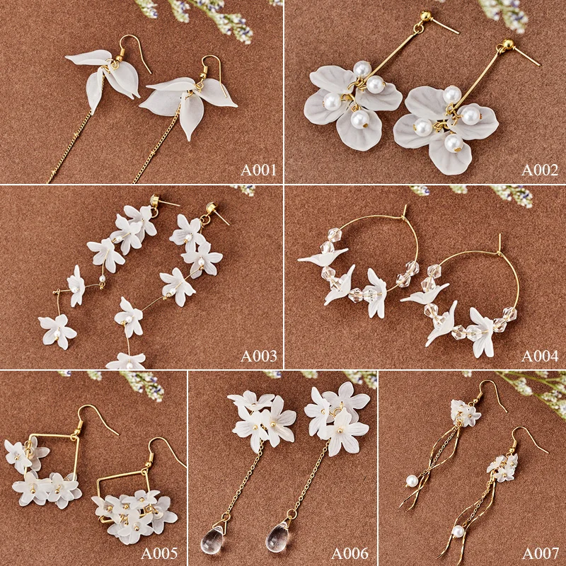 Корейские модные серьги QCOOLJLY длинные с лепестками кристаллов и кисточками
