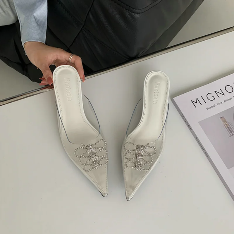

2021 spring and summer diamond-studded crystal Baotou high-heeled semi-drag rhinestone bow transparent sandals pointed toe mules