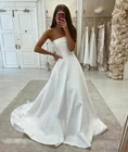 Платье свадебное атласное ТРАПЕЦИЕВИДНОЕ с карманами, длинный корсет без бретелек, белый наряд невесты до пола, на заказ
