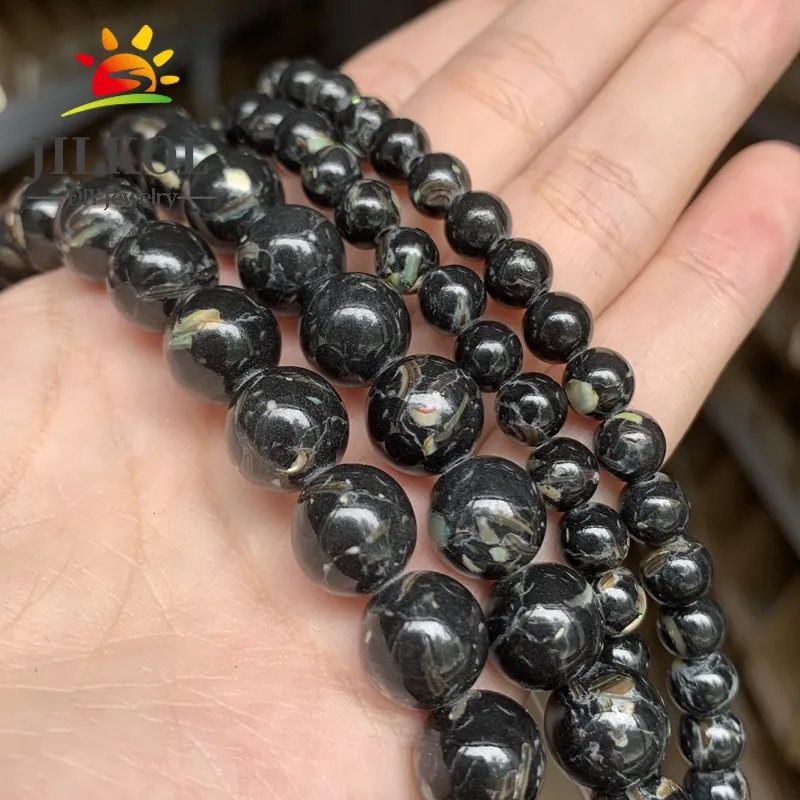 Круглые бусины из натурального черного говлита незакрепленные для изготовления