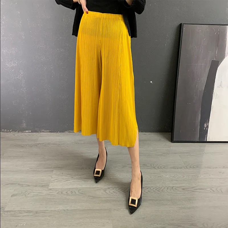 

Plus Size Pants For Women 2021 Autumn Solid Color Loose Stretch Miyake Pleated Casual Wide Leg Trousers Mid-Calf Length