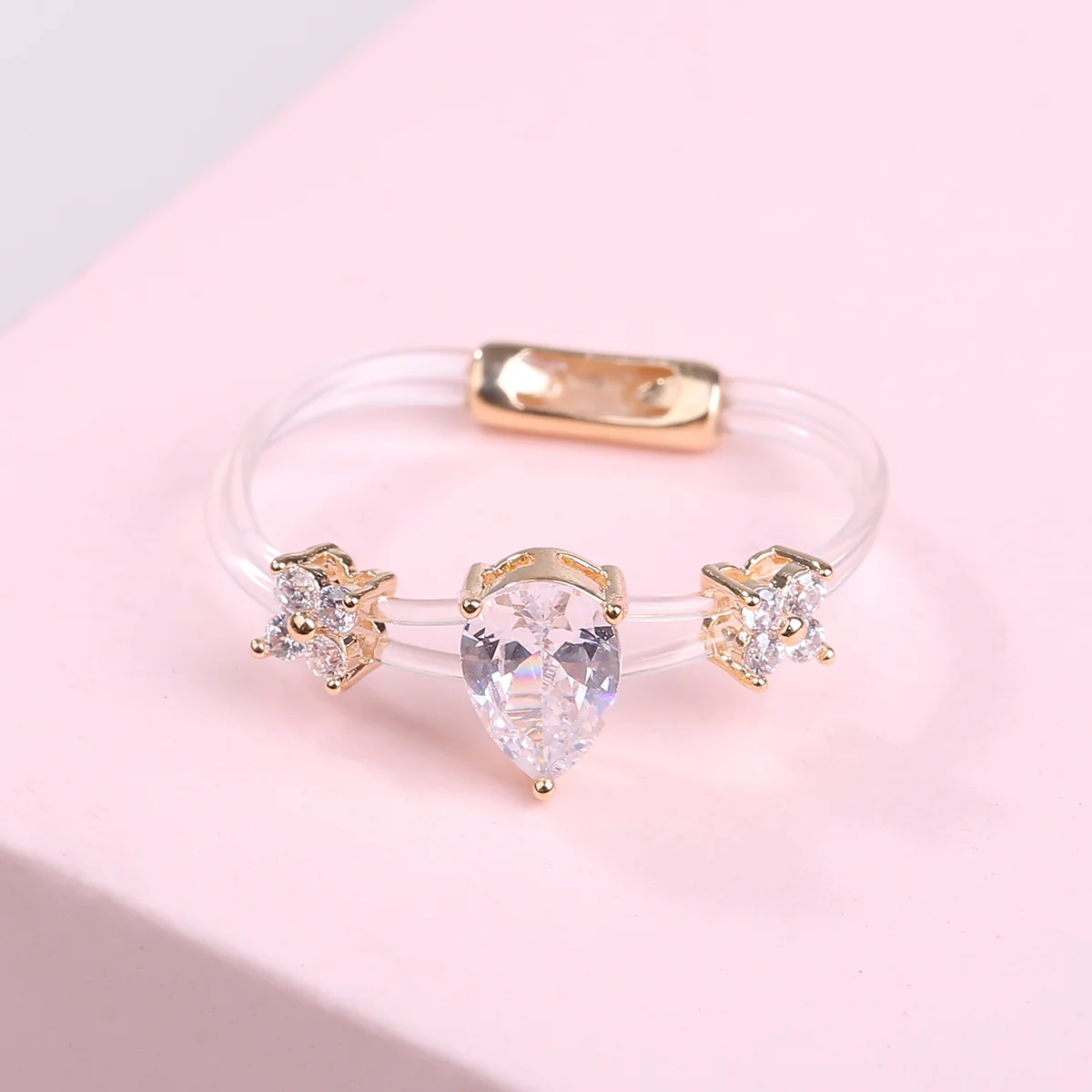 

New European and American simple drop-shaped romantic micro-inlaid zircon copper invisible ring ladies handmade jewelry gifts
