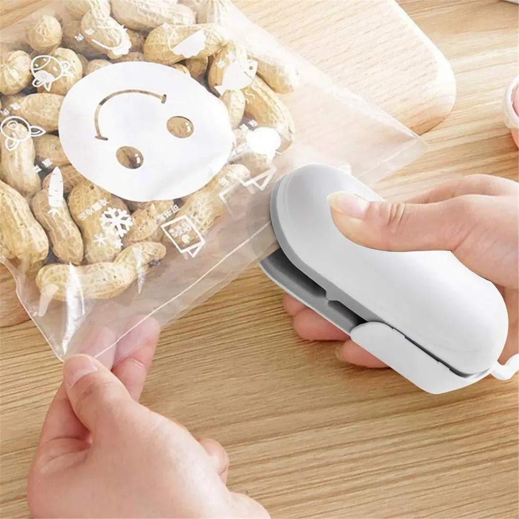 

Handheld Vacuum Sealer / 2-In-1 Heat Sealer And Cutter Re-Sealer Plastic Bag Food Storage Snack Bag Fresh Bag Sealer