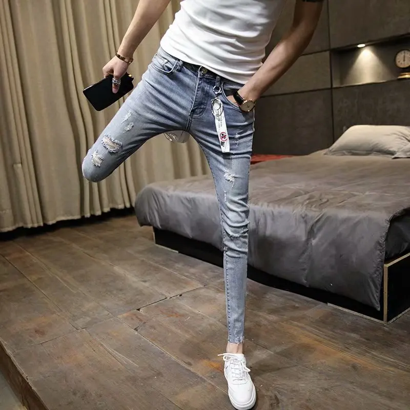

Wholesale 2020 Fashion Casual Teenagers Student Social Spirit Guy Ripped Hole Denim Jeans Men's Slim Pants Leggings Pencil Pants