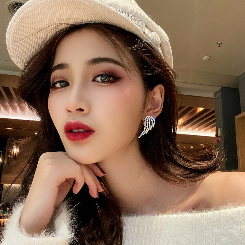 Роскошные элегантные серебряные серьги гвоздики с перьями и крыльями ангела для