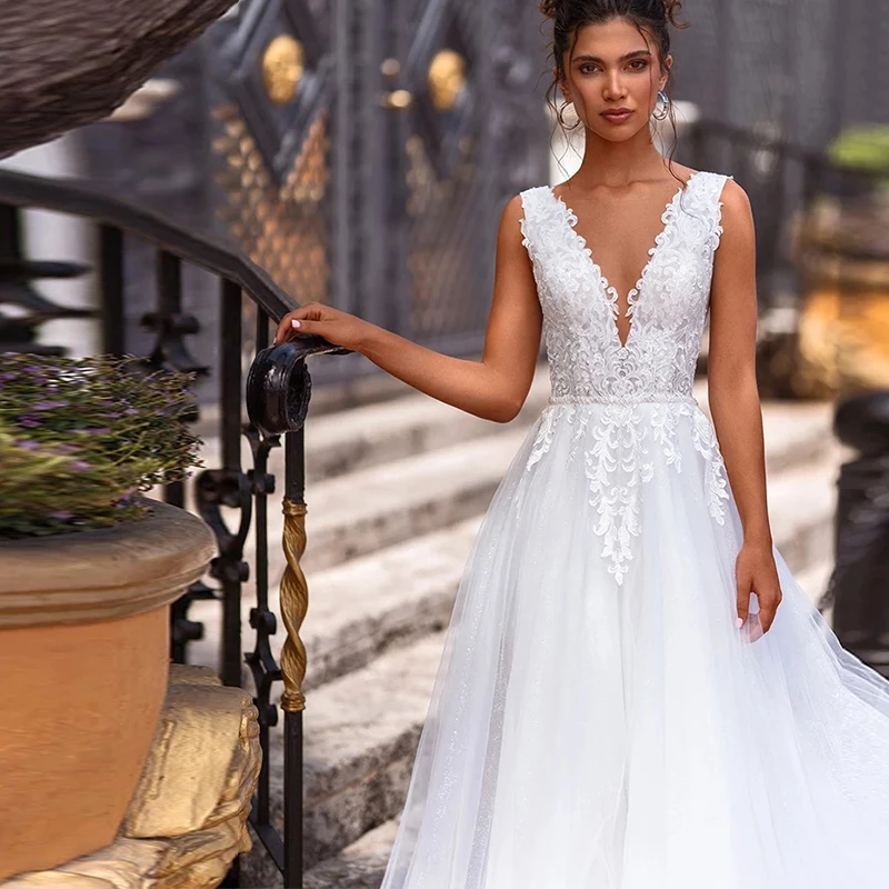 

YiXuan 2021 New Arrival Princess See Through GlitterTulle V-Neck Sleeveless Appliques Long A-line Weeding Dress Special Occasion