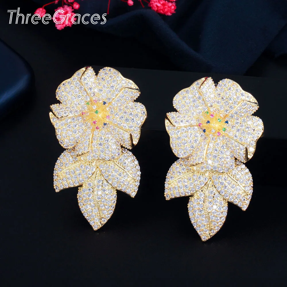 

ThreeGraces Luxury Flower Shape White Cubic Zirconia Big Gold Color Leaf Dangle Wedding Party Earrings for Ladies Jewelry ER635