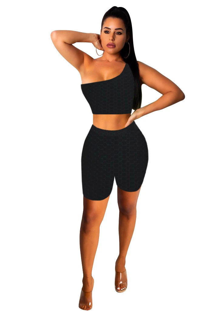 

Q21s799 European American women's spring and summer single shoulder pineapple cloth Yoga leisure sports style two piece set whol