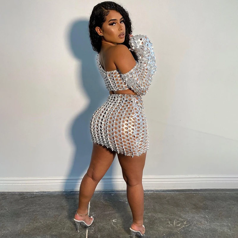 

CIBBAR Casual Solid Hollow Out Two Piece Set Women One Shoulder Crop Top And Bodycon Mini Skirt Suit Summer Sexy Female Clothing