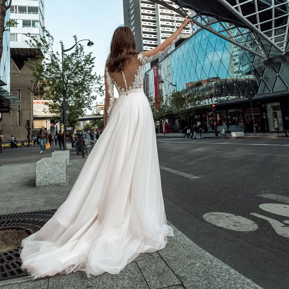 

Vestidos Elegant Wedding Dresses Tulle Illusion Appliques Beading V-Neck Full Sleeve Covered Button Ball Bridal Gowns