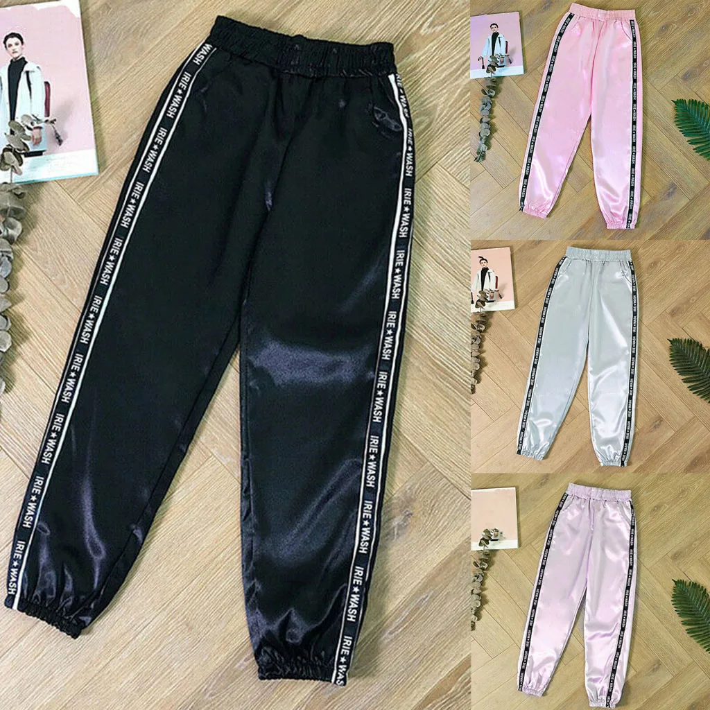 Модные женские штаны с карманами надписью и эластичной талией светоотражающие