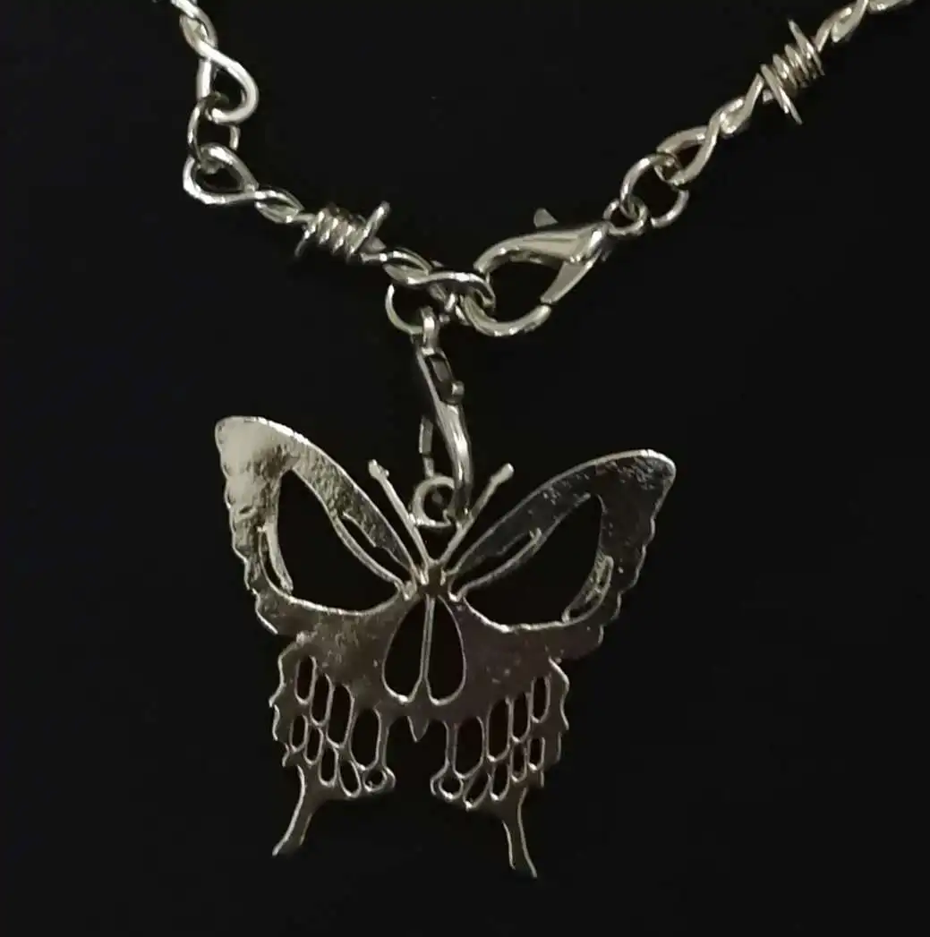 

Retro thorn butterfly ghost face pendant Gothic ghost hip hop chain pre Christmas nightmare Gift Men's and women's jewelry