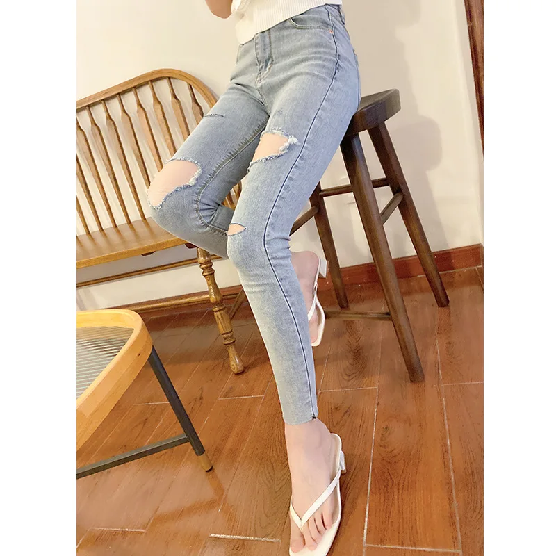 

Fall 2021 New Korean light blue ripped jeans high waist slimming stretch slim nine-minute pants women