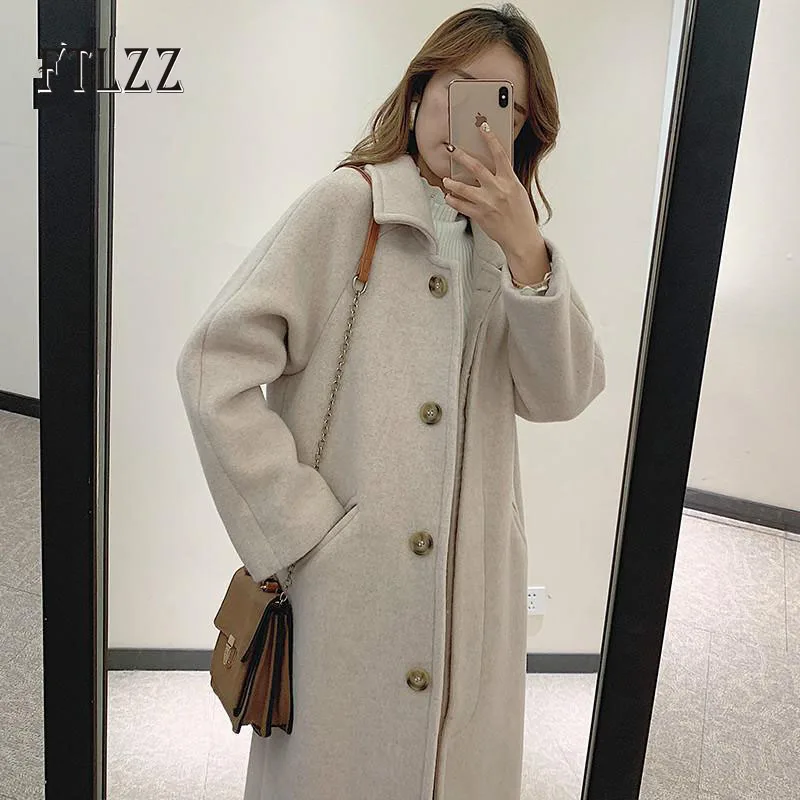 Женское шерстяное пальто средней длины облегающее черное с отложным воротником