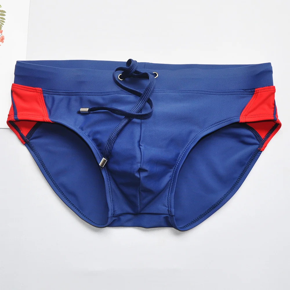 

Brand summer color matching fashionable triangle swimming trunks beach trend triangle swimming trunks for men