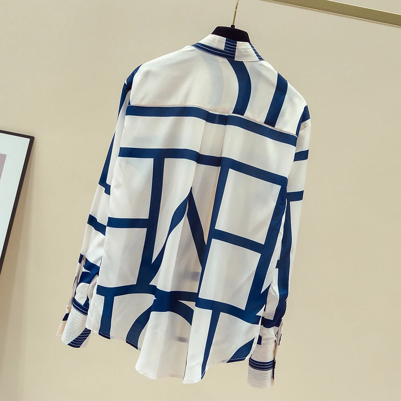 

Fashion contrast color striped turn-down collar thin loose long-sleeved shirt women autumn new irregular hem elegant loose top