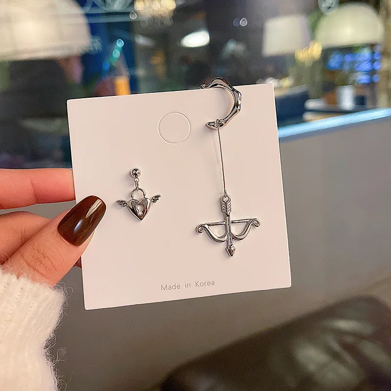 

New bow and arrow love heart earrings female asymmetric normcore style ear clip earrings Accessories Fashion Jewelry