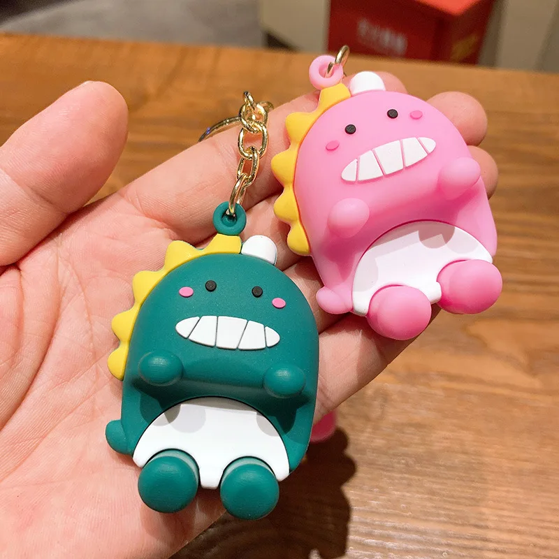 

Cute animal small dinosaur mobile phone bracket key chain pendant cartoon silicone PVC car key chains bag pendant 2020